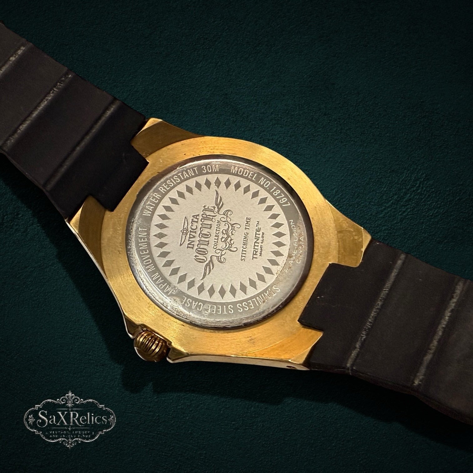 SaX Relics Invicta Angel 18797 watch caseback showing the model number and stainless steel markings