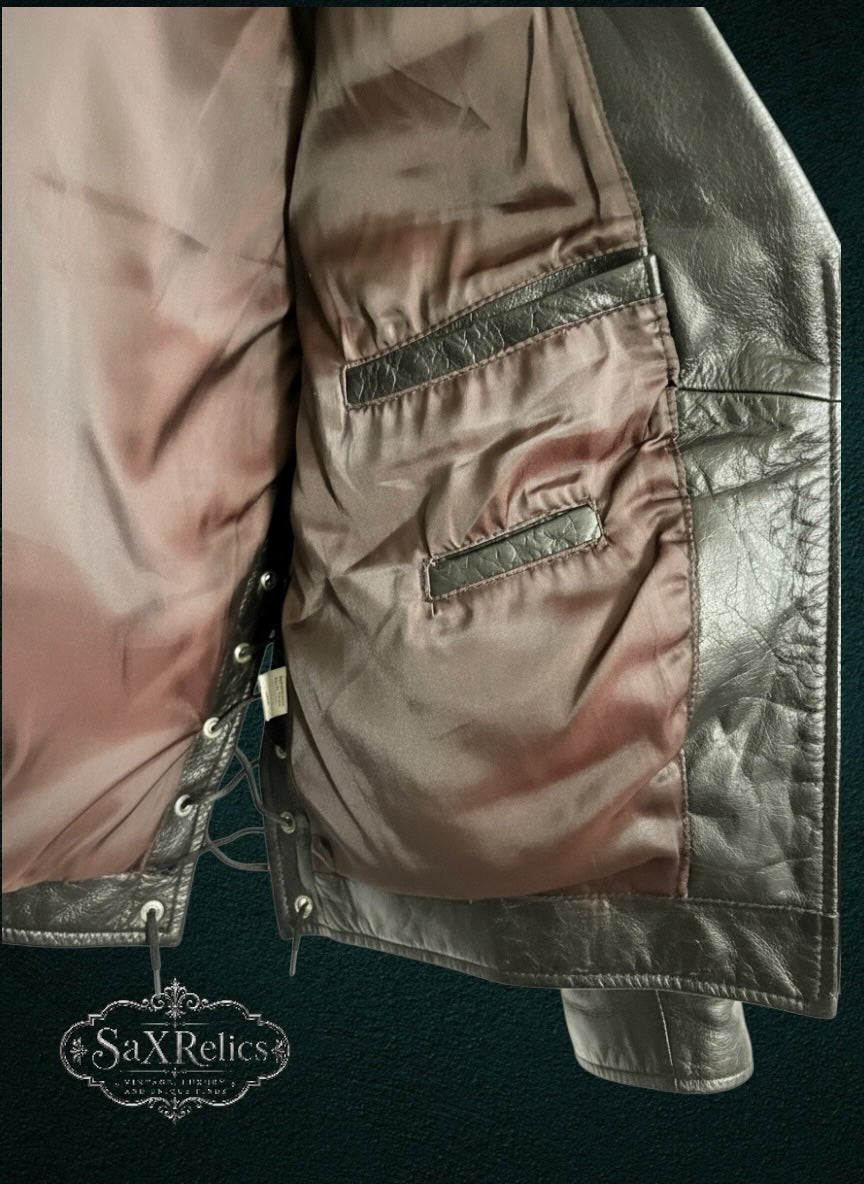 Interior of My Store JAMIN LEATHER black motorcycle vest with brown polyester lining and leather-trimmed pockets.
