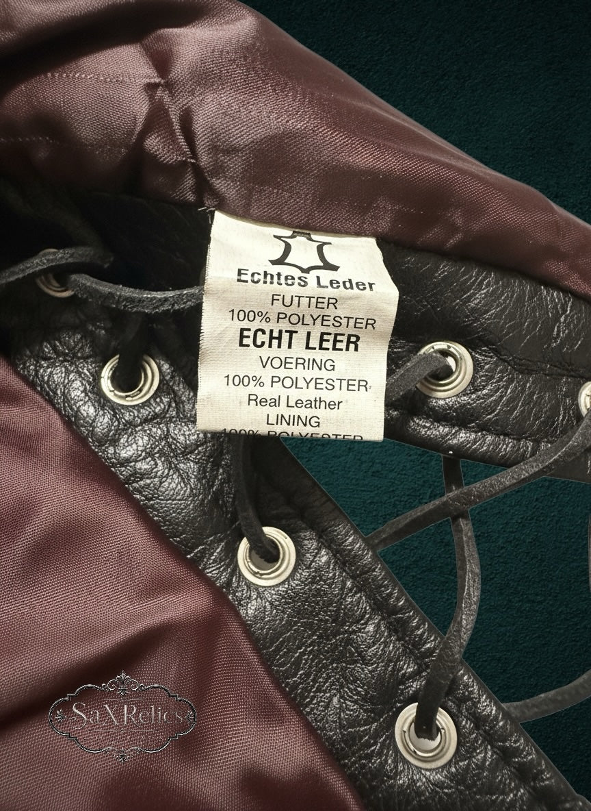 My Store JAMIN LEATHER motorcycle vest interior label showing genuine black leather and maroon polyester lining