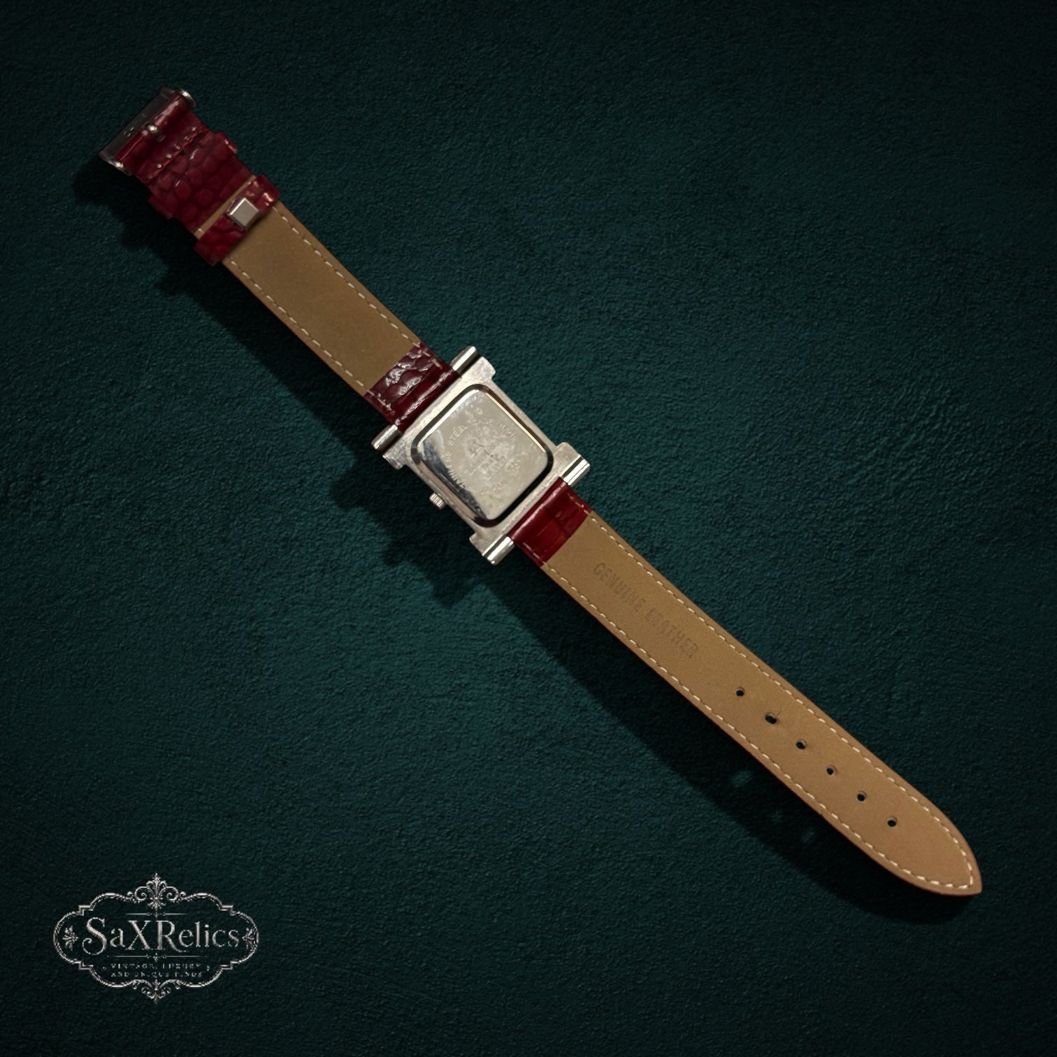 SaX Relics Louis Arden Paris watch showing the red leather strap and caseback