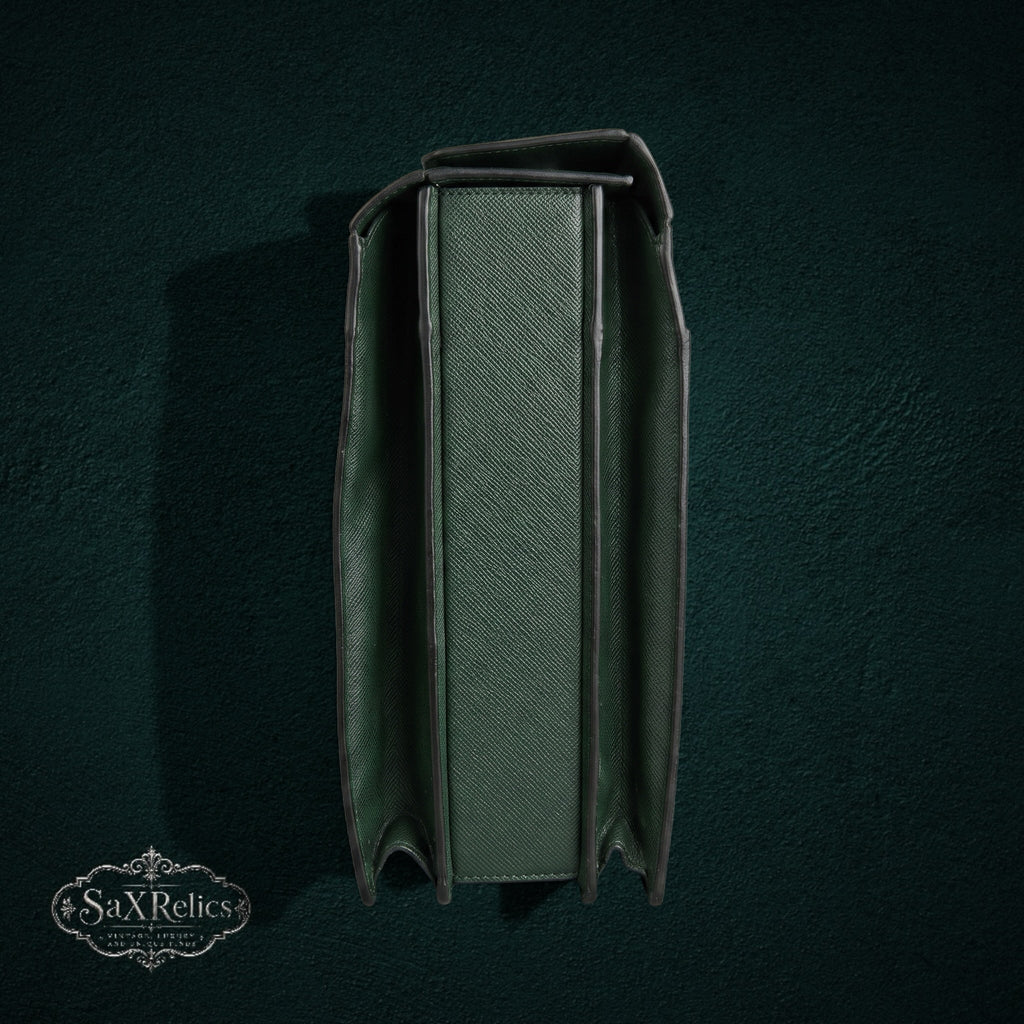 Vintage Louis Vuitton briefcase in forest green Taiga leather with a structured side profile view
