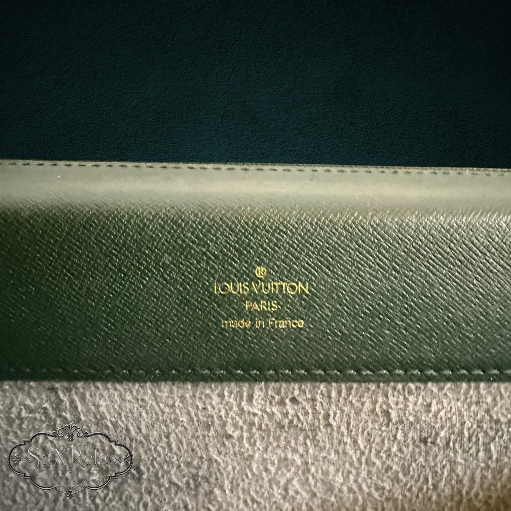 Vintage Louis Vuitton forest green Taiga leather briefcase with gold embossed logo and stitching detail