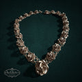 SaX Relics — Rosal vintage Taxco 925 sterling silver necklace of dimensional sculpted rose blossoms.