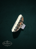 My Store modern statement ring with an elongated, architectural grid design and high-shine metallic finish.