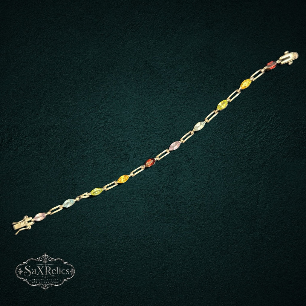 My Store multi-gemstone link bracelet featuring marquise-cut colorful stones set in a polished metal chain
