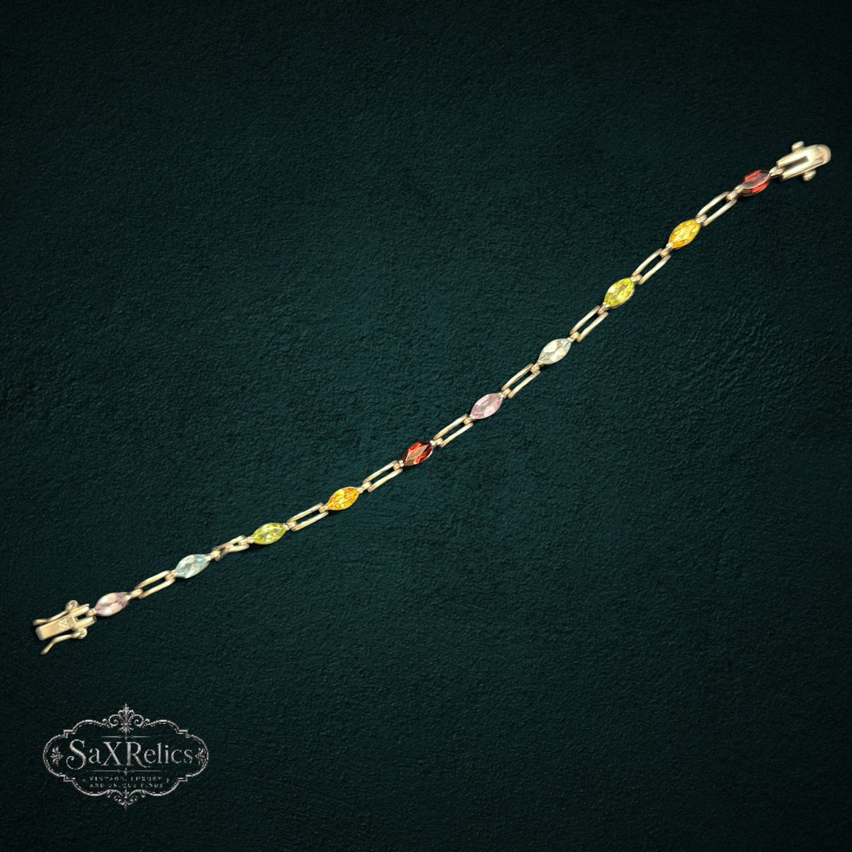 My Store multi-gemstone link bracelet featuring marquise-cut colorful stones set in a polished metal chain