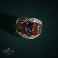My Store statement ring featuring marquise-cut rubies, sapphires, and emeralds in a gold-tone leaf-inspired setting.