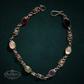SaX Relics — Espiral vintage sterling silver bracelet set with six oval stones between spiral links.