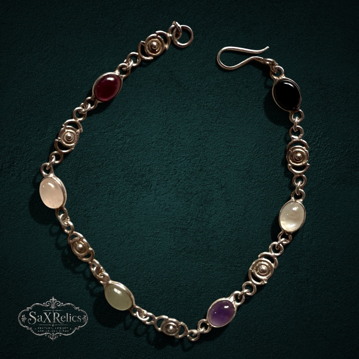 SaX Relics — Espiral vintage sterling silver bracelet set with six oval stones between spiral links.