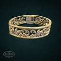 SaX Relics vintage sterling silver hinged bangle with openwork floral filigree scrollwork