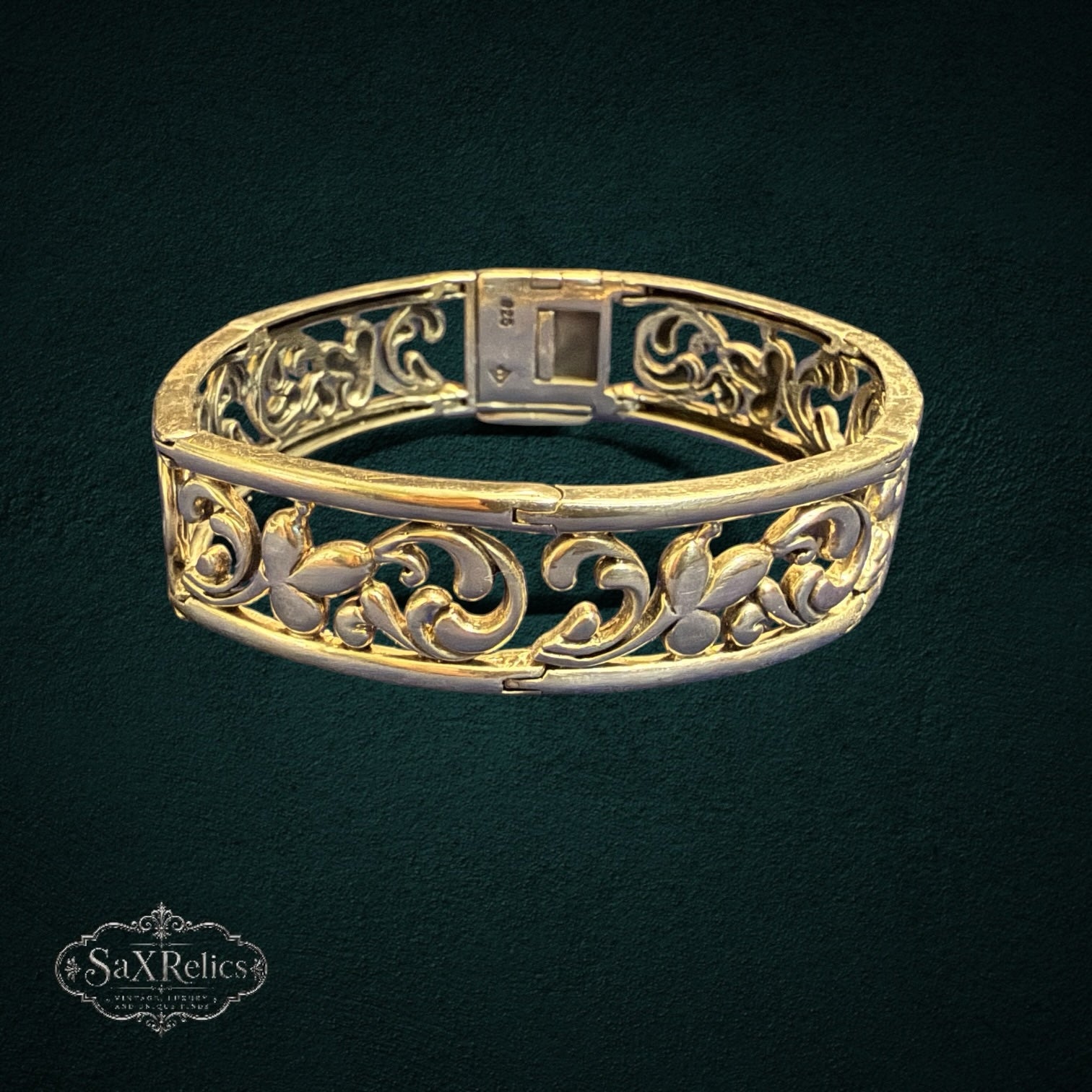 SaX Relics vintage sterling silver hinged bangle with openwork floral filigree scrollwork