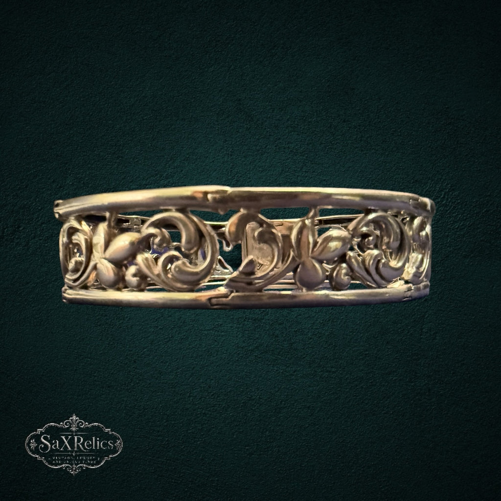SaX Relics vintage sterling silver filigree hinged bangle showing floral and scroll motifs