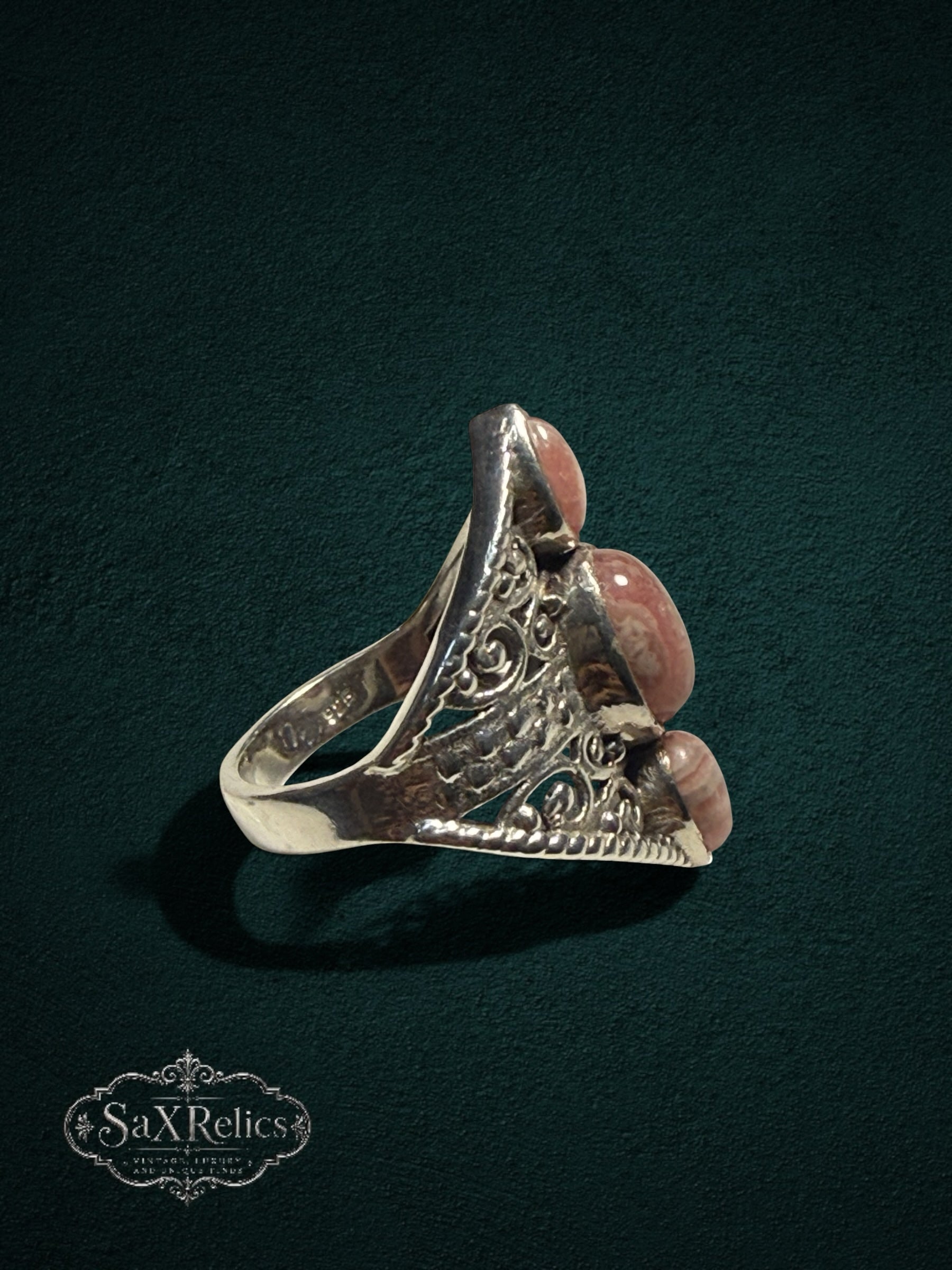 My Store SAXRelics ornate silver statement ring featuring three earthy cabochon stones and intricate filigree scrollwork.