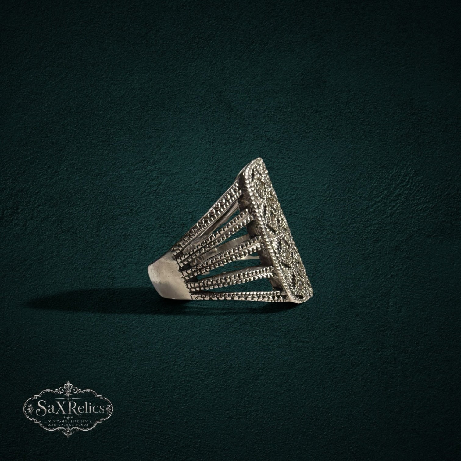 My Store silver-toned statement ring with intricate filigree openwork and marcasite stones on a ribbed band.