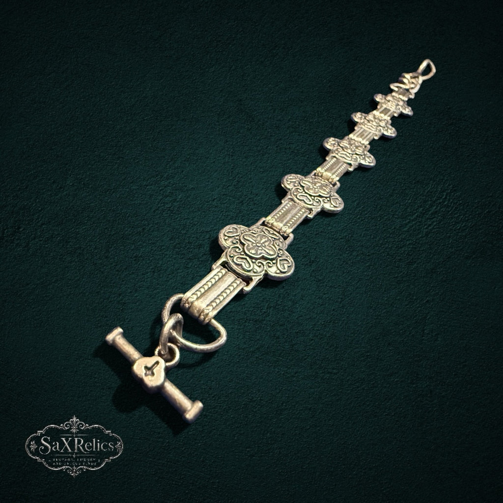 SaX Relics Brighton silver-plated ornate clover link bracelet showing the toggle closure
