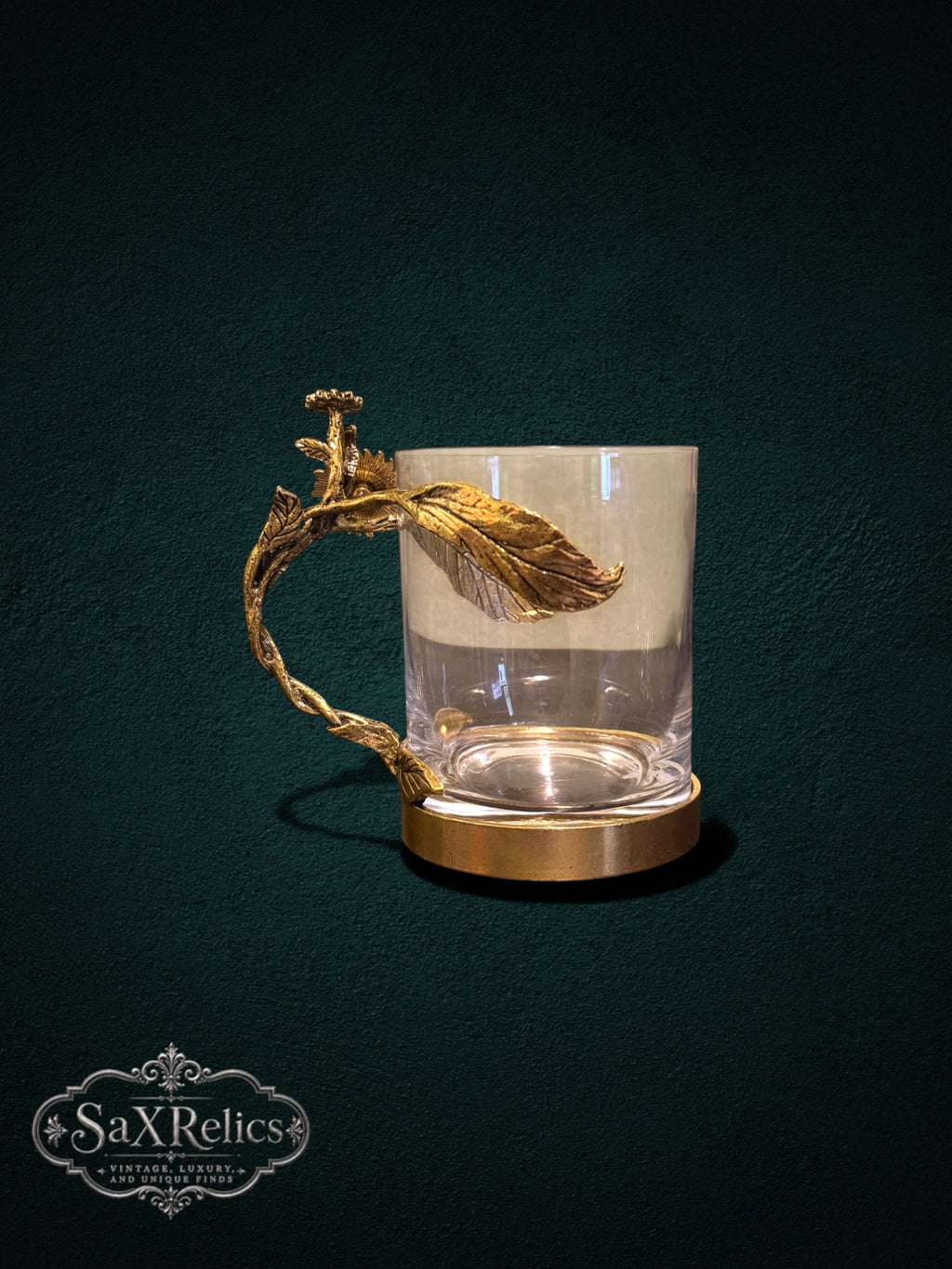 My Store decorative clear glass with an ornate antique-gold metal handle featuring botanical leaf and sunflower motifs.