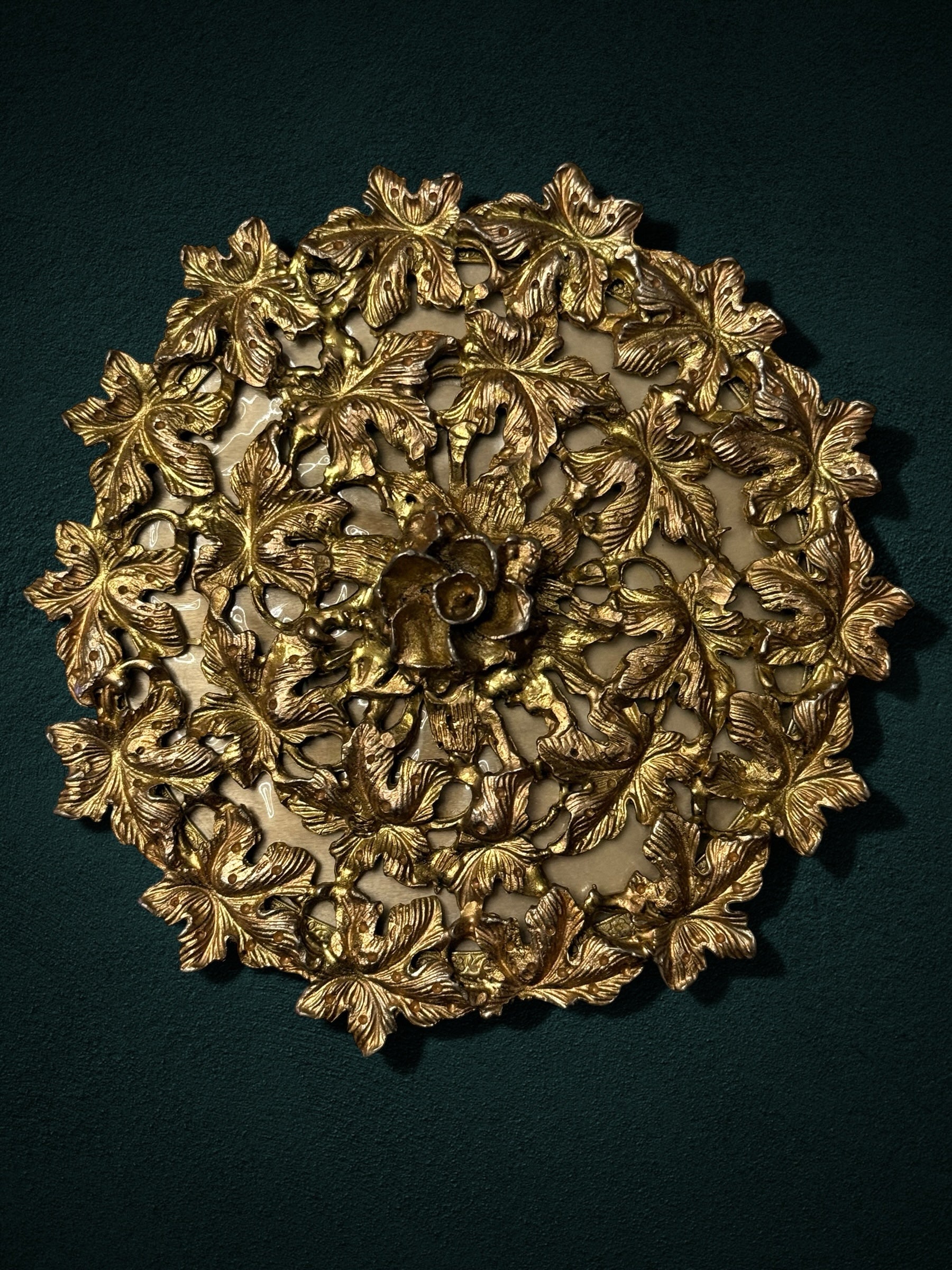 My Store ornate gold metal trinket box lid featuring detailed sculptural leaves and a central rose design.