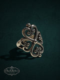 My Store SAXRelics sterling silver ring featuring an ornate quatrefoil filigree design with a polished finish.