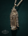 My Store SaxRelics silver-tone Our Lady of Guadalupe pendant necklace with shimmering stones on a classic curb chain