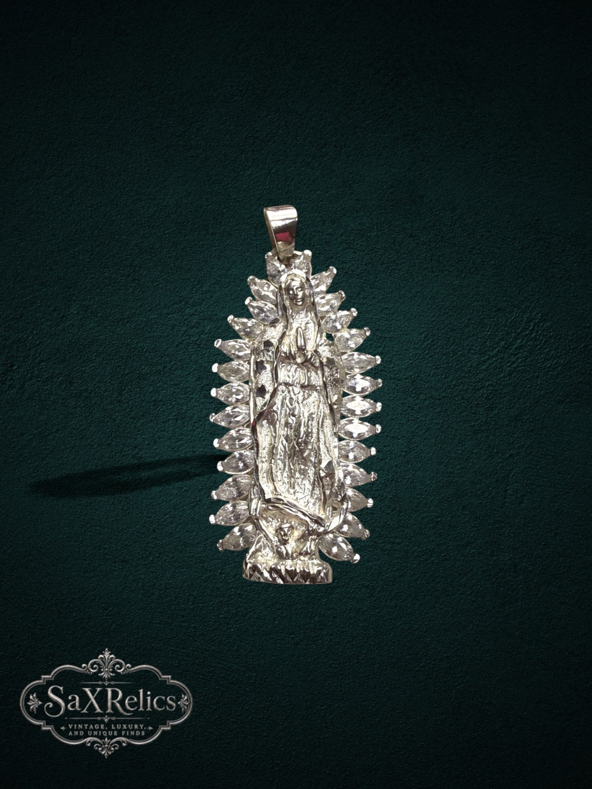 My Store Our Lady of Guadalupe silver pendant featuring a Virgin Mary figure surrounded by marquise-cut crystal stones