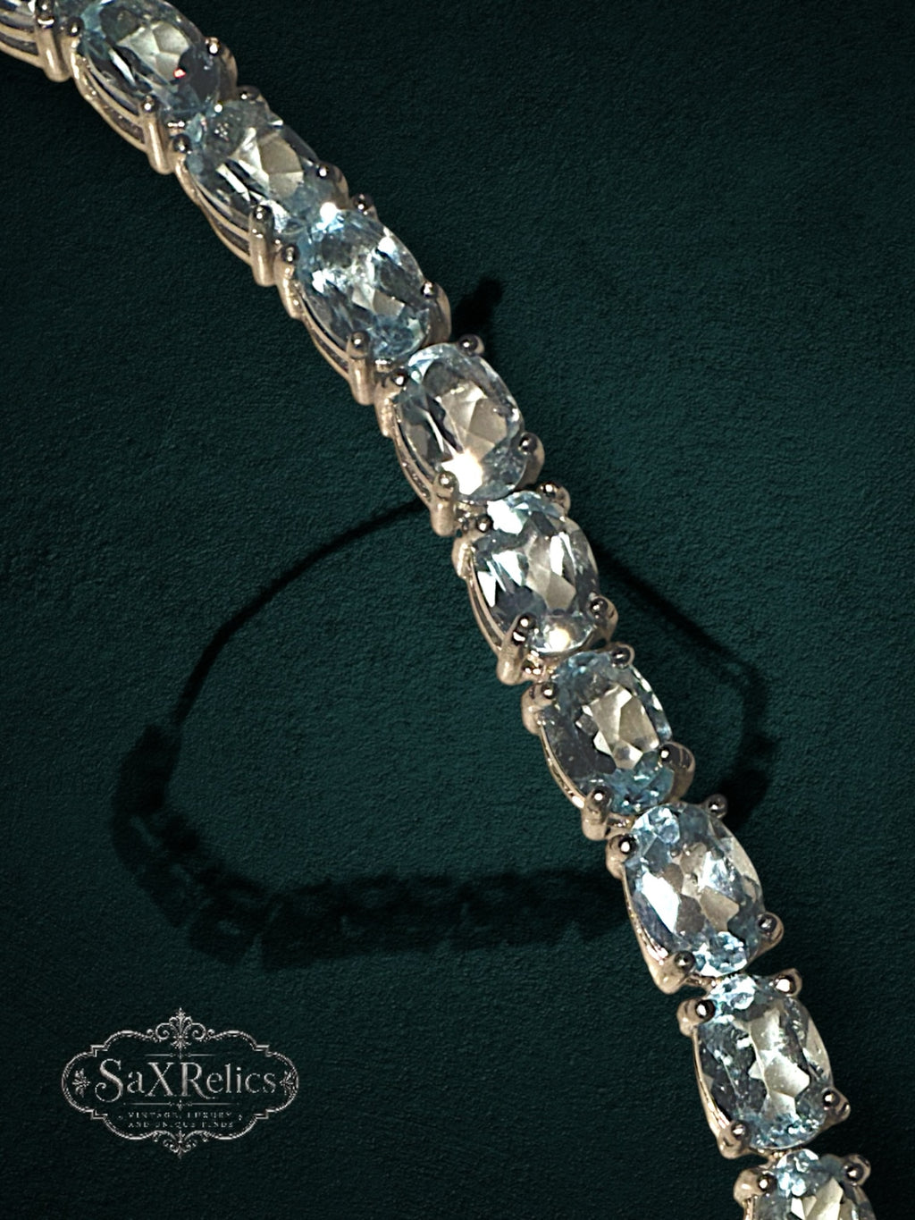 My Store elegant tennis bracelet featuring clear oval-cut crystals in a gold-tone setting with an adjustable clasp.