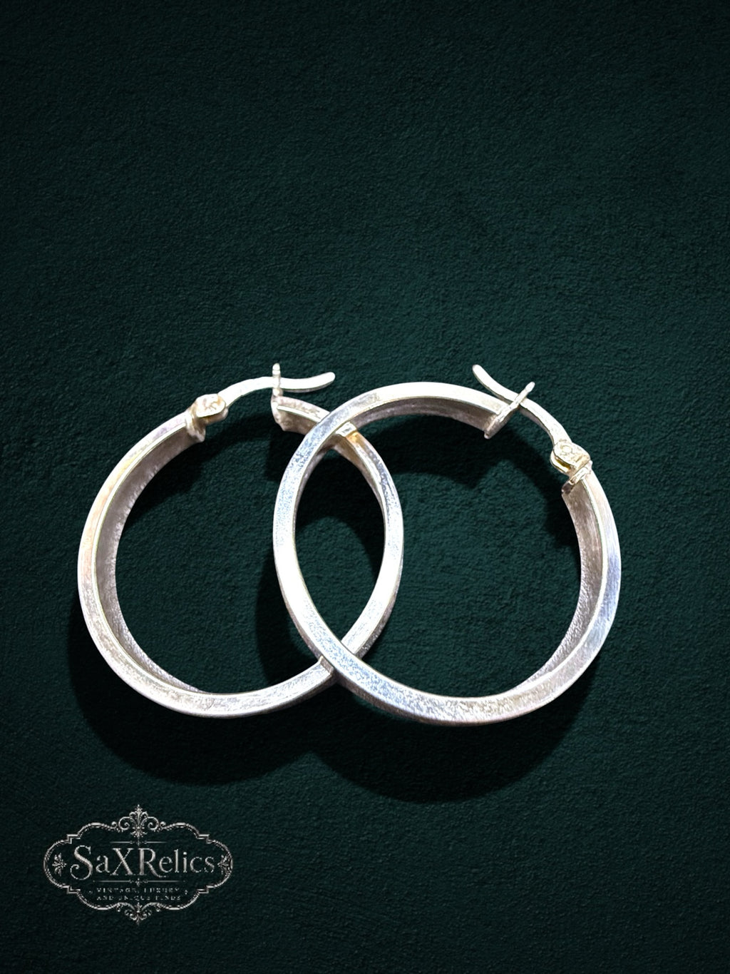 My Store polished sterling silver hoop earrings with engraved circular accents and secure hinged closures
