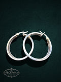 My Store polished sterling silver hoop earrings with engraved circular accents and secure hinged closures