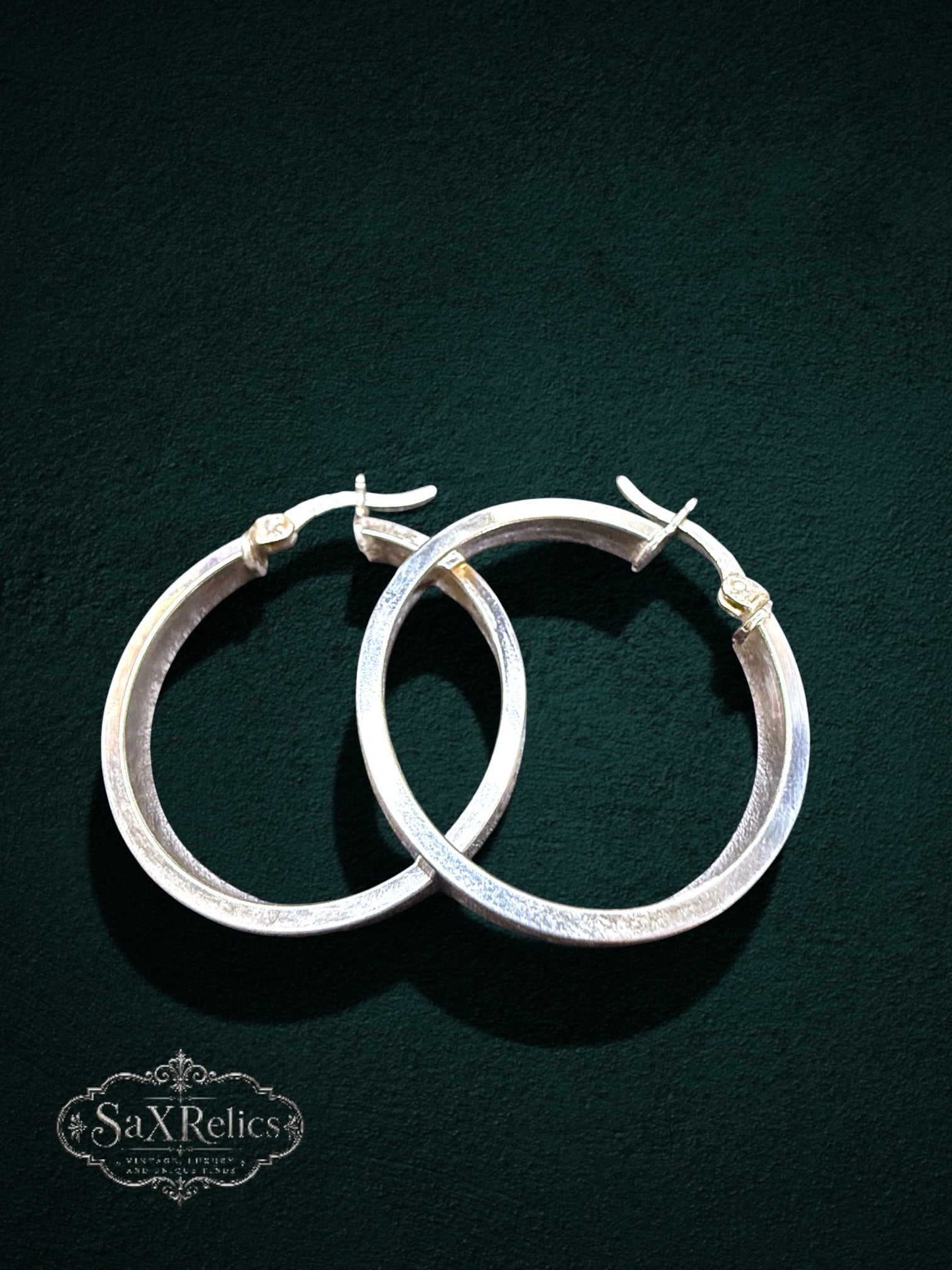 My Store polished sterling silver hoop earrings with engraved circular accents and secure hinged closures