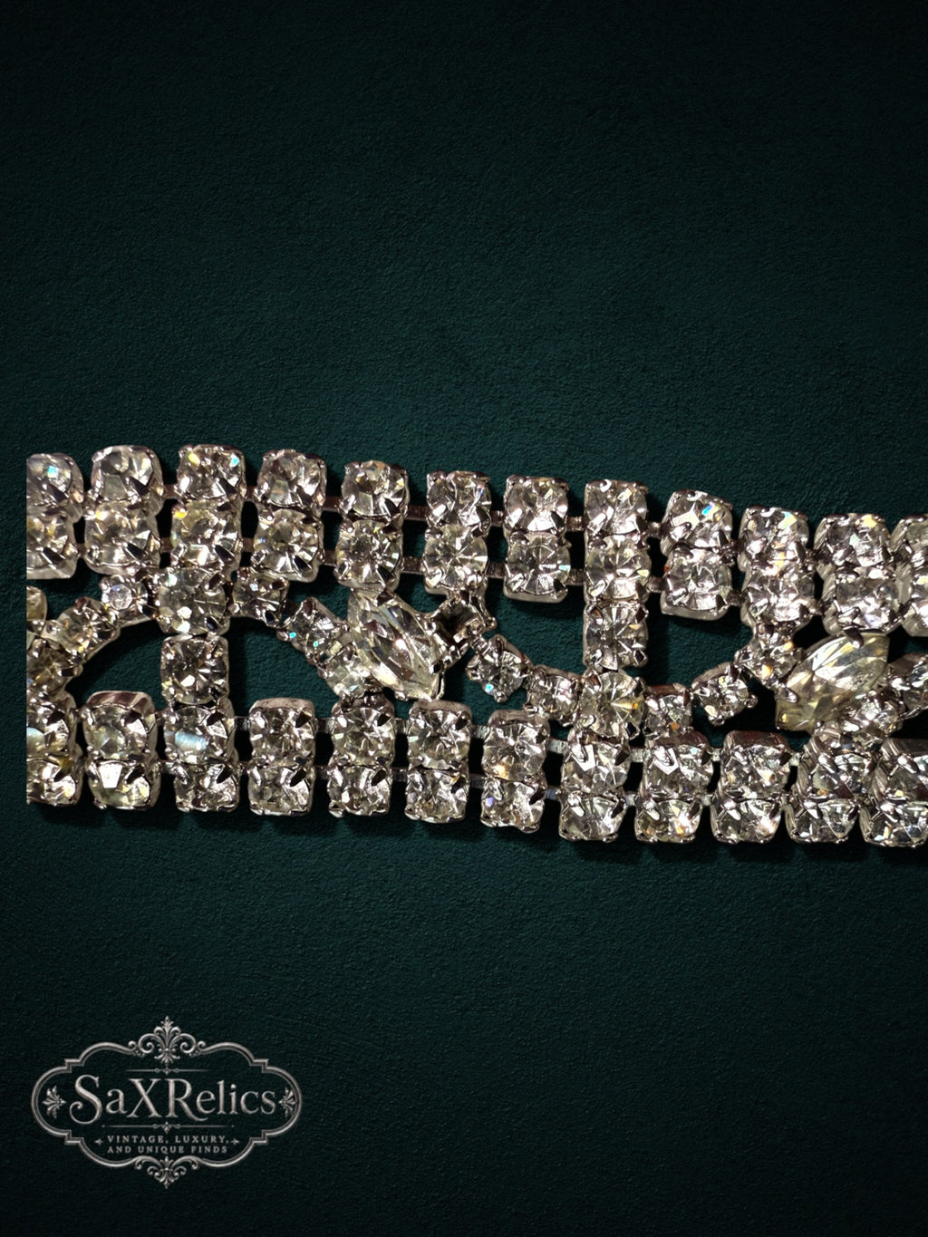 Vintage-inspired wide cuff bracelet with clear rhinestones and marquise-cut crystals in silver-tone metal