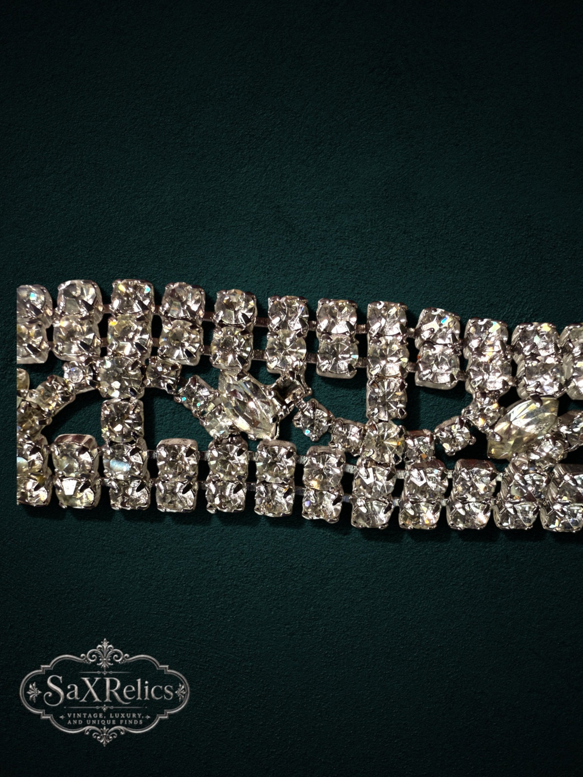 Vintage-inspired wide cuff bracelet with clear rhinestones and marquise-cut crystals in silver-tone metal