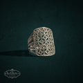 My Store SAXRelics silver-toned statement ring with intricate filigree openwork and shimmering marcasite stone accents.