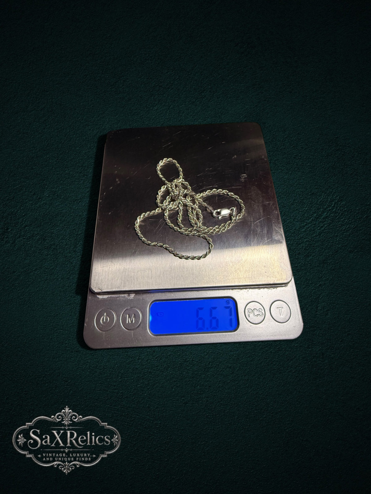 Soga sterling silver rope chain weighing 6.67 grams on a scale