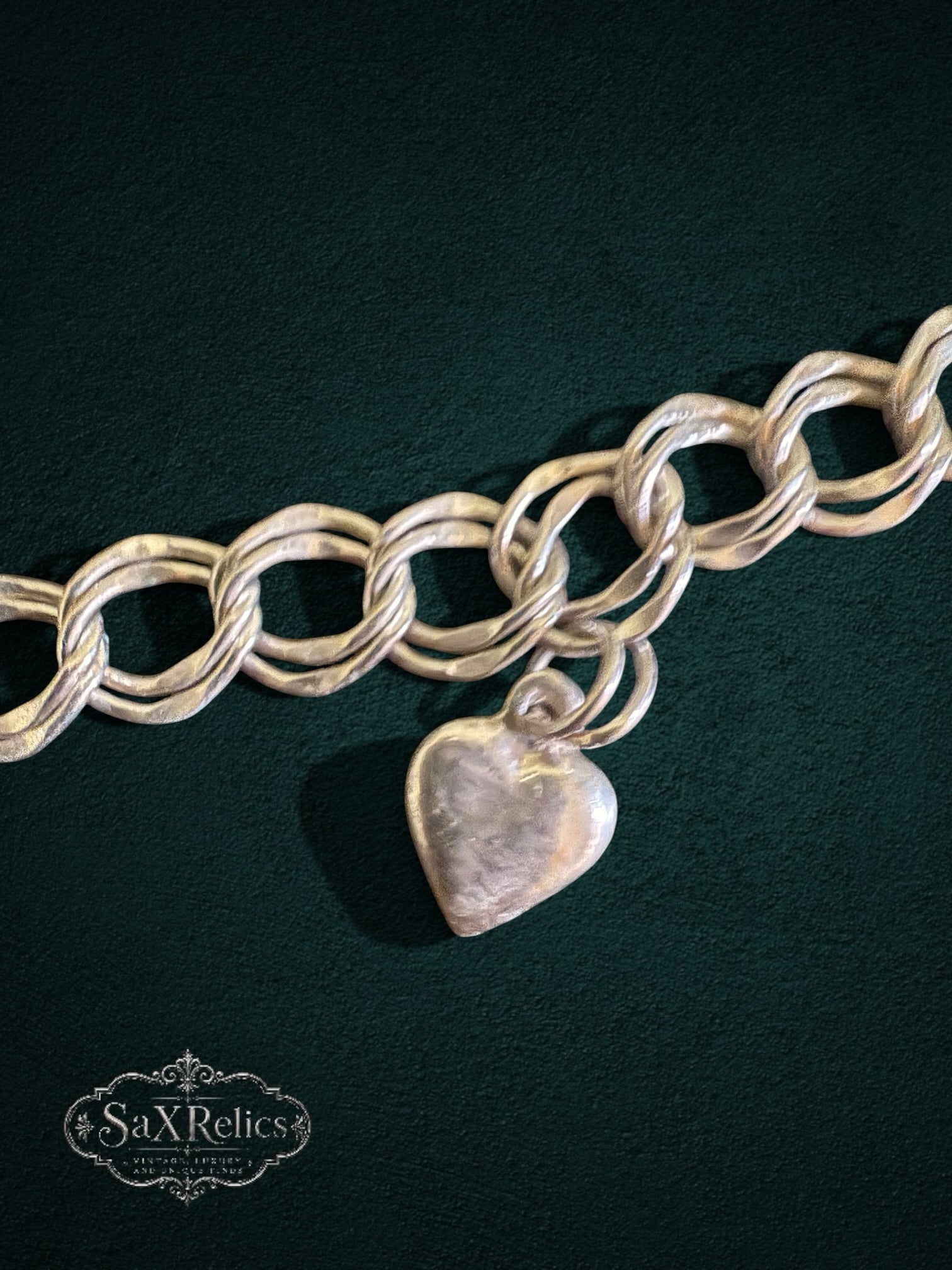 My Store SAXRelics vintage-inspired silver-tone double-link charm bracelet with a smooth heart charm on dark background