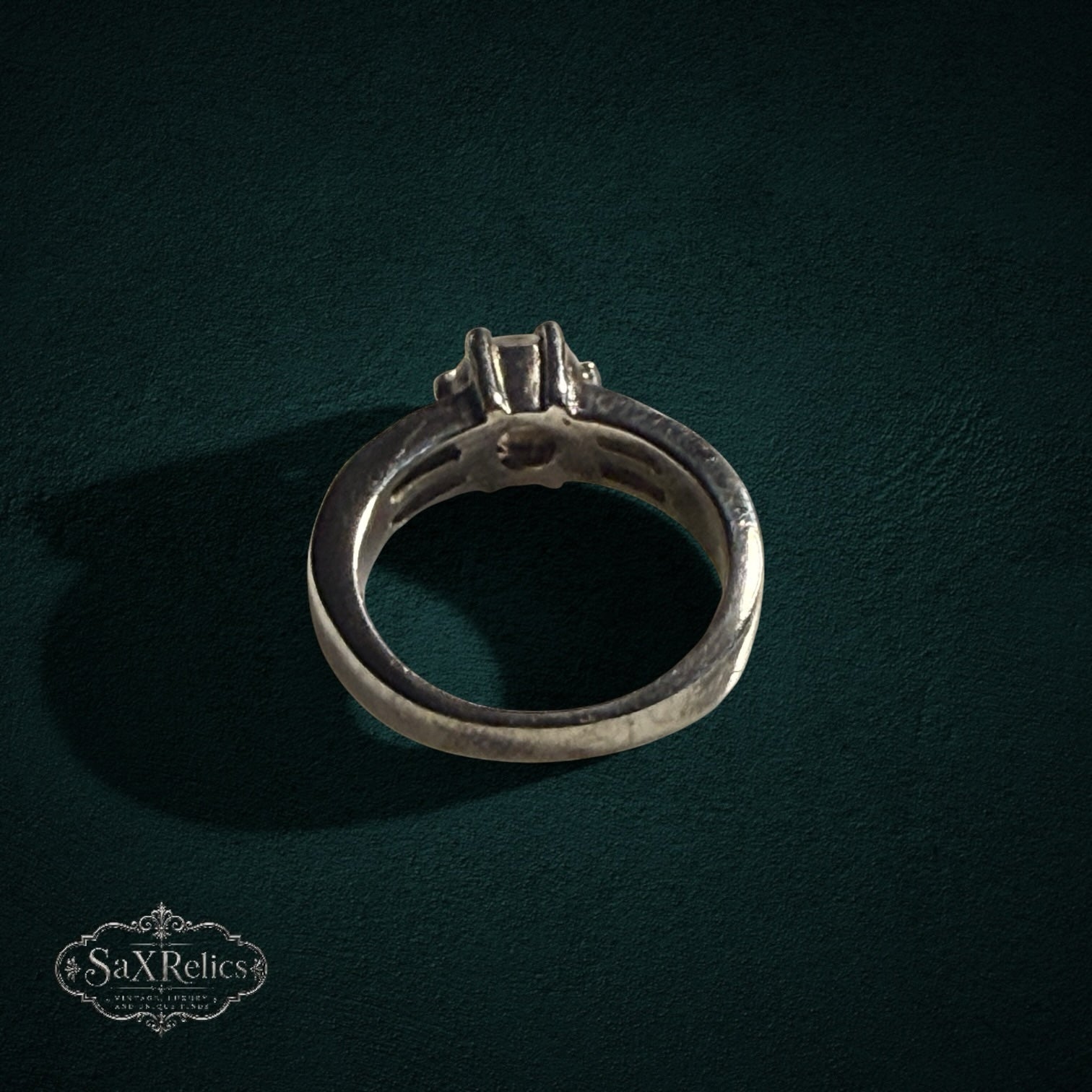 My Store SAXRelics silver-tone solitaire fashion ring with prong-set center stone and accented shoulders