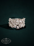 My Store SAXRelics silver-tone statement ring featuring a cluster of sparkling high-clarity stones on a split-shank band