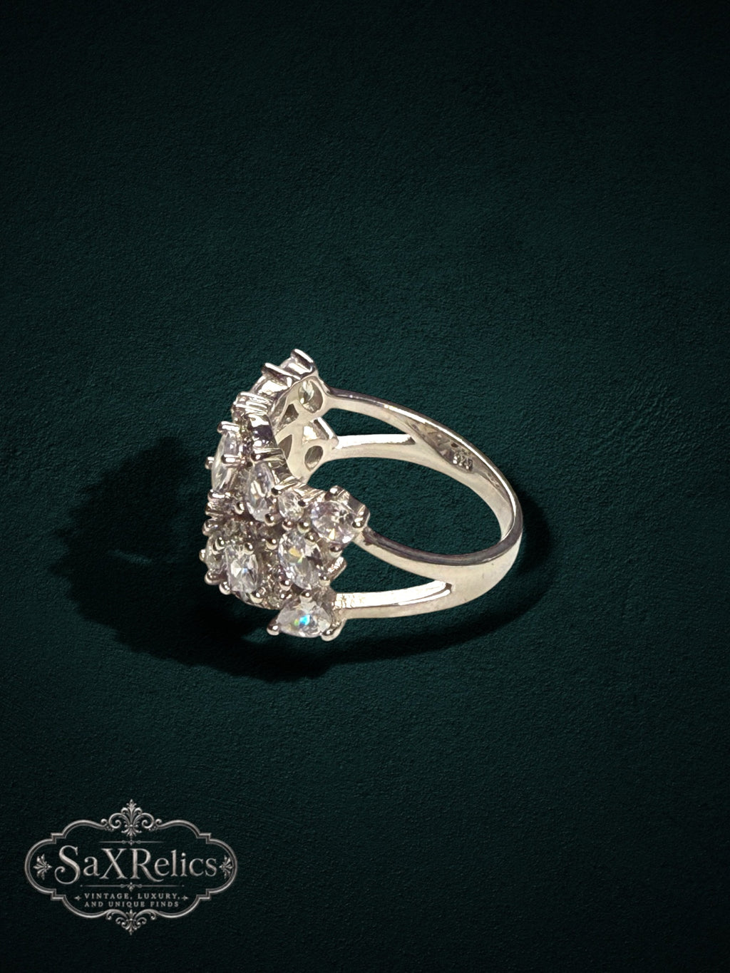 My Store SAXRelics silver-tone statement ring with a cluster of sparkling stones and a comfortable split-shank design.