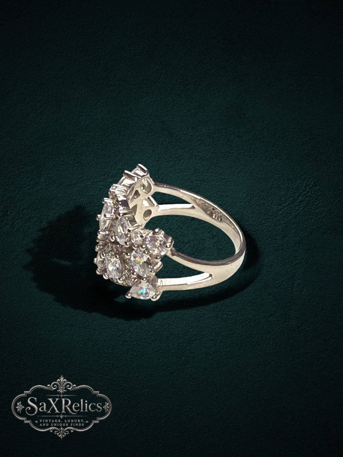 My Store SAXRelics silver-tone statement ring with a cluster of sparkling stones and a comfortable split-shank design.