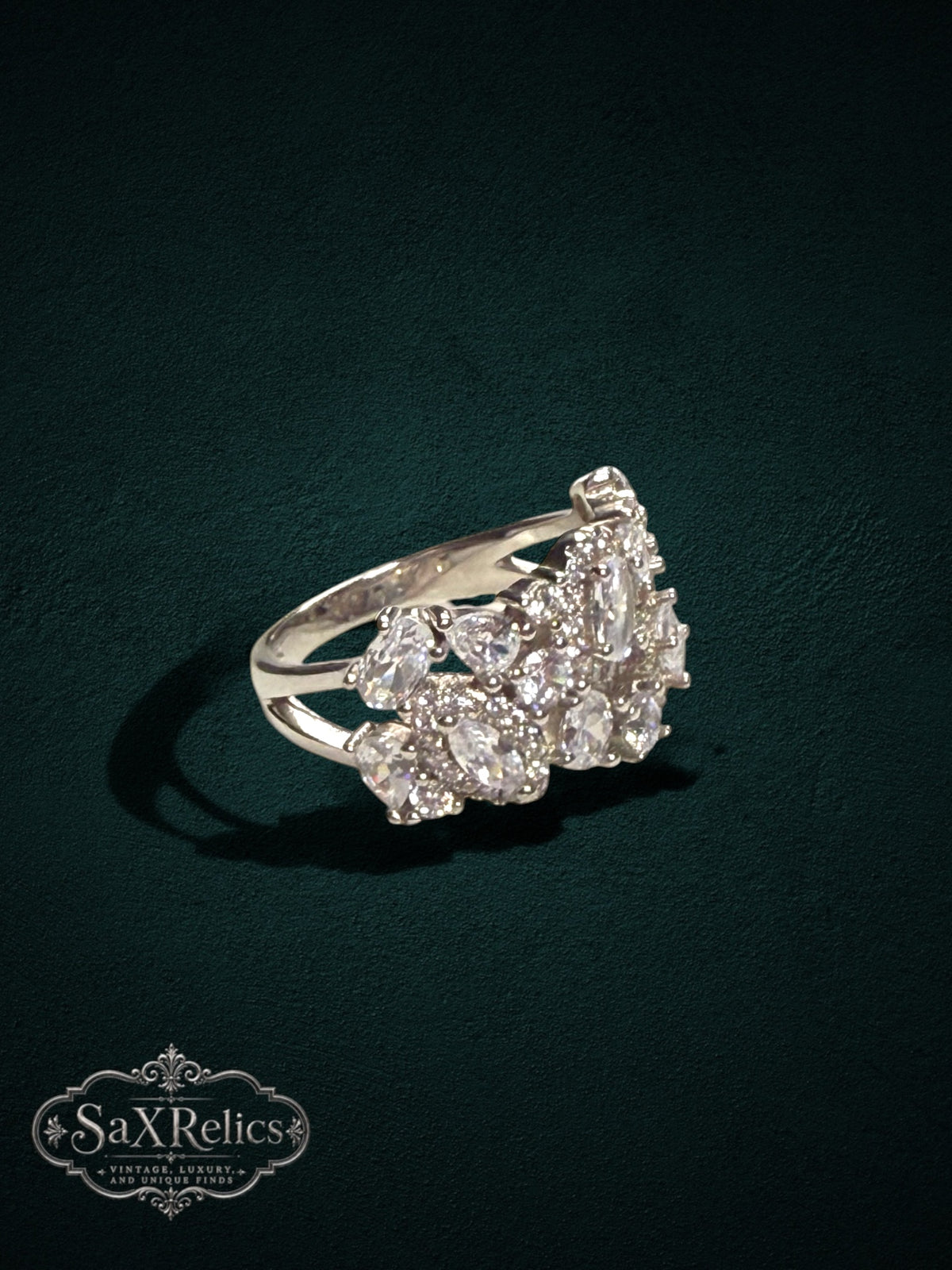My Store SAXRelics silver-tone statement ring with a cluster of sparkling stones and a comfortable split-shank design.