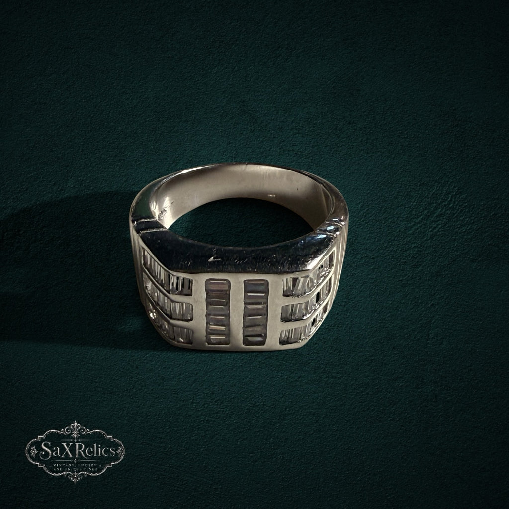 My Store SAXRelics sterling silver statement ring featuring architectural baguette-cut stones on a polished band.