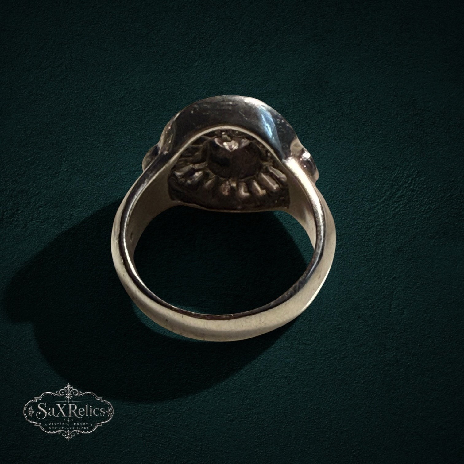 My Store SAXRelics vintage style 925 sterling silver statement ring with intricate circular halo and baguette accents
