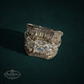 My Store SAXRelics wide sterling silver statement ring with baguette and princess-cut stones on a dark background