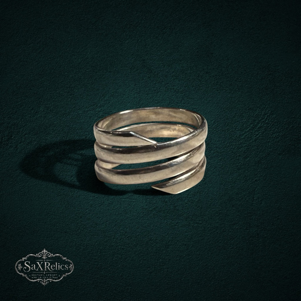 My Store SAXRelics multi-layered sterling silver wrap ring with a polished, sculptural coil design.