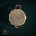 SaX Relics vintage silver-tone cuff watch on a dark brown croc-embossed vinyl band