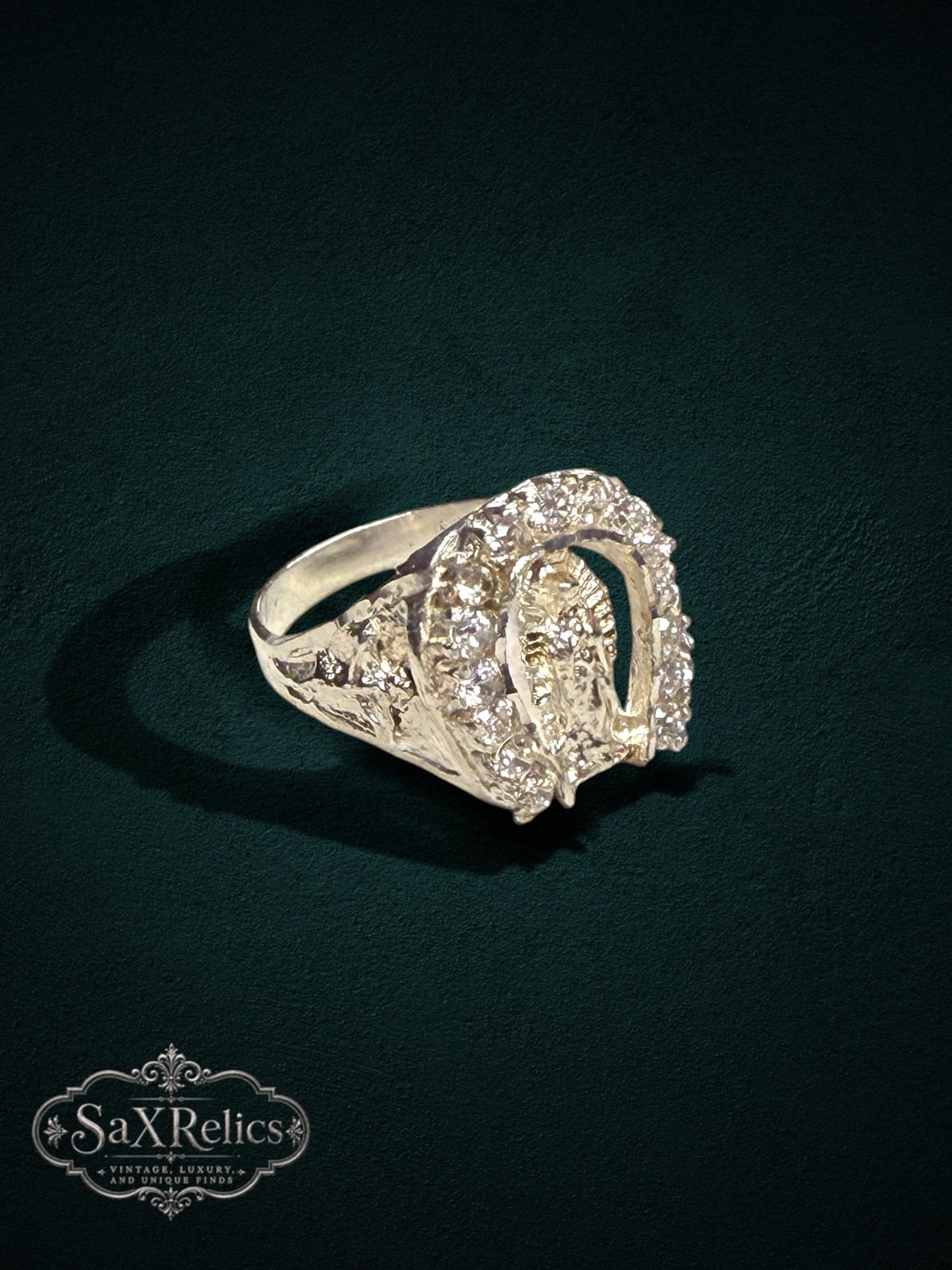 My Store SAXRelics vintage-inspired ring featuring a Virgin Mary centerpiece in a horseshoe frame with stone accents.