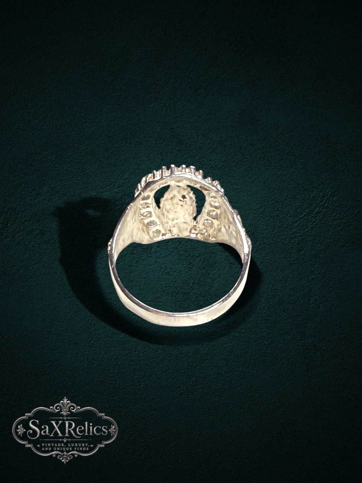 My Store SAXRelics silver religious ring featuring a Virgin Mary centerpiece in a horseshoe frame with stone accents.