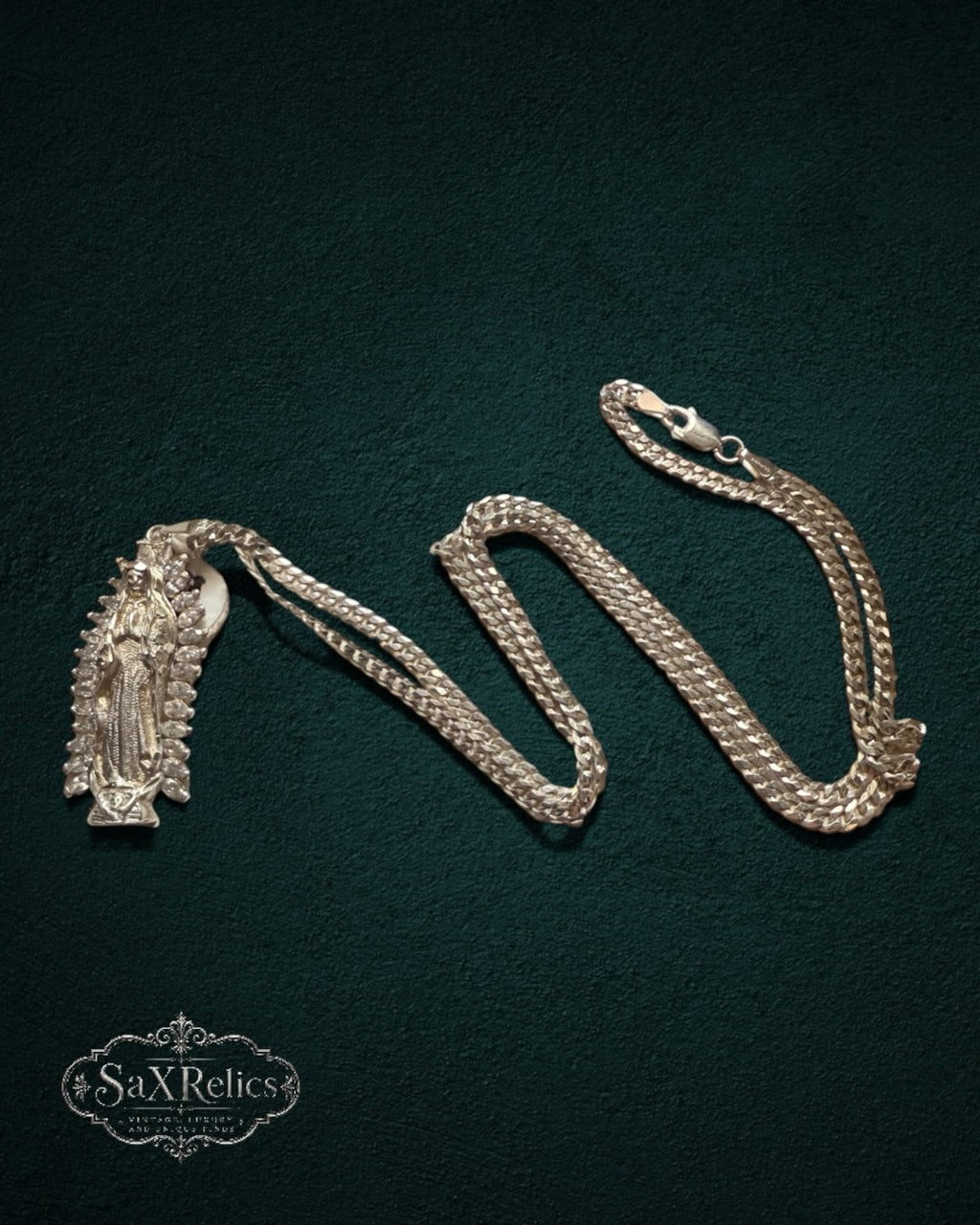 My Store SaxRelics silver-tone Our Lady of Guadalupe pendant necklace with a shimmering stone halo and curb chain.