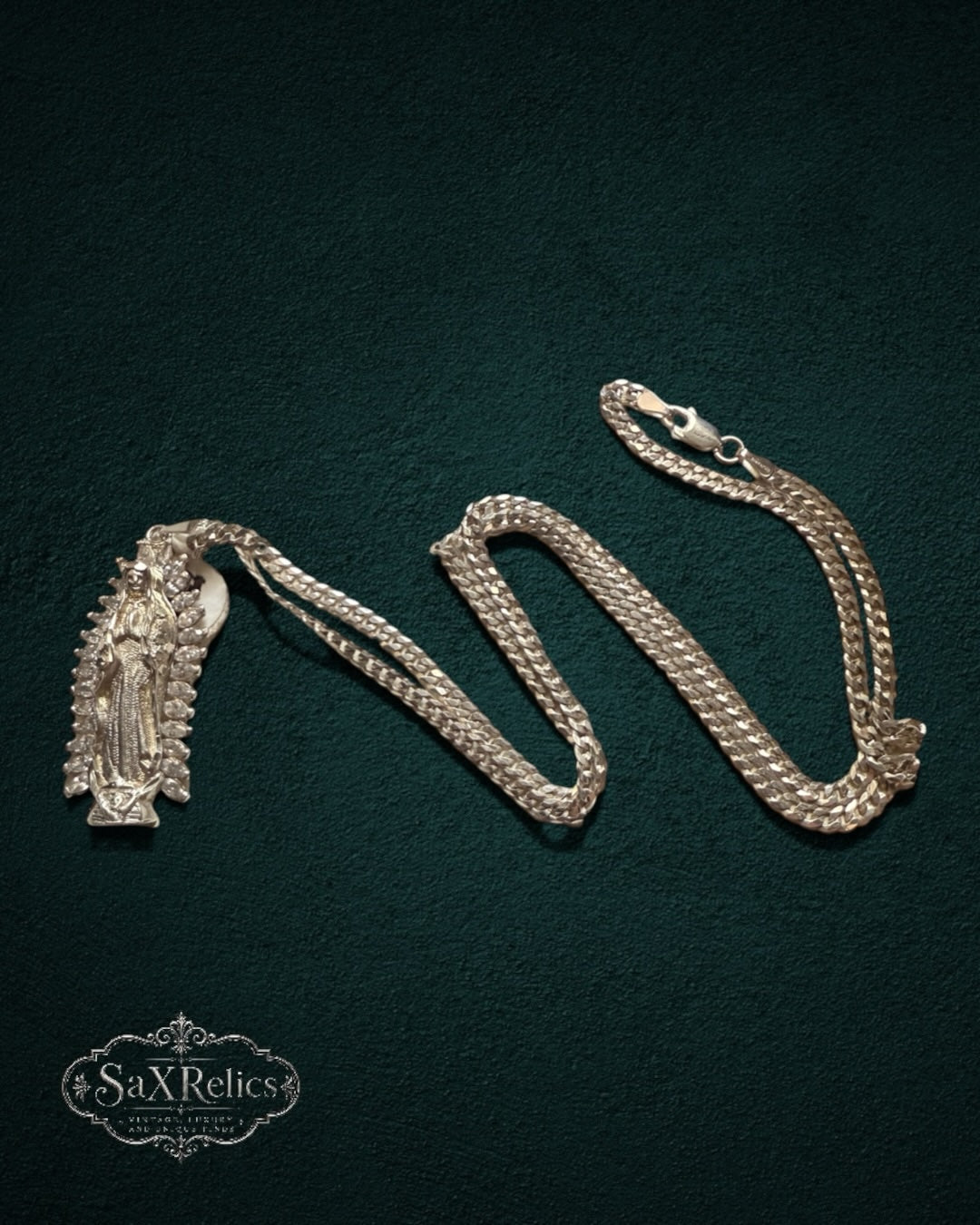 My Store SaxRelics silver-tone Our Lady of Guadalupe pendant necklace with a shimmering stone halo and curb chain.