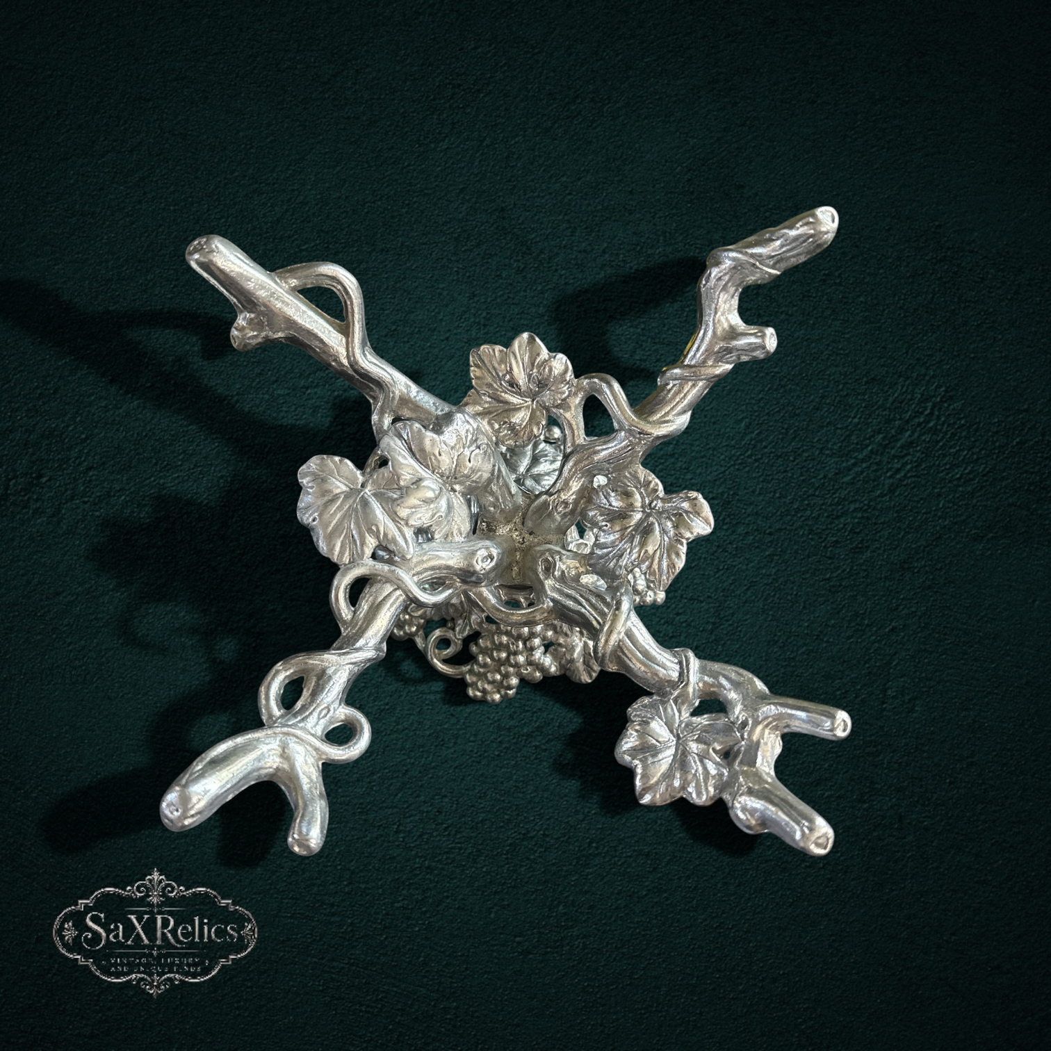 My Store silver metal grapevine tabletop display stand with intricate leaf and fruit detailing for home decor