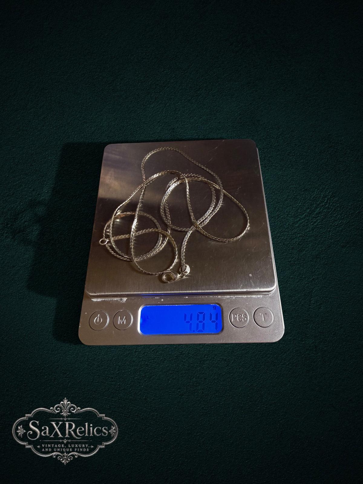 Corriente sterling silver herringbone chain weighing 4.84 grams on a scale