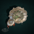 My Store silver-plated scalloped shell serving dish set with ornate borders on a dark green background.